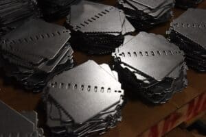 Stacks of punched metal plates