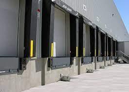 A row of several loading dock doors